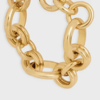 Bransoletka CELINE Charms Heritage z mosiądzu z wykończeniem w kolorze złotym Bransoletka CELINE Charms Heritage z mosiądzu z wykończeniem w kolorze złotym