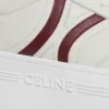 CELINE – trampki z blokowym obcasem, z tyłu z motywem Triomphe i podeszwą na koturnie, wykonane ze skóry cielęcej CELINE – trampki z blokowym obcasem, z tyłu z motywem Triomphe i podeszwą na koturnie, wykonane ze skóry cielęcej