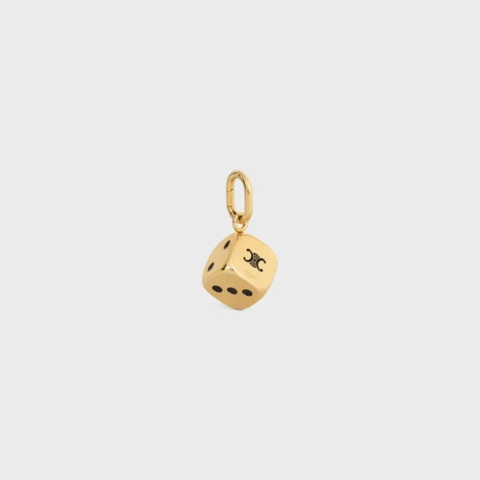 Charms CELINE Triomphe w kształcie kości do gry, wykonane z emalii i aluminium Charms CELINE Triomphe w kształcie kości do gry, wykonane z emalii i aluminium