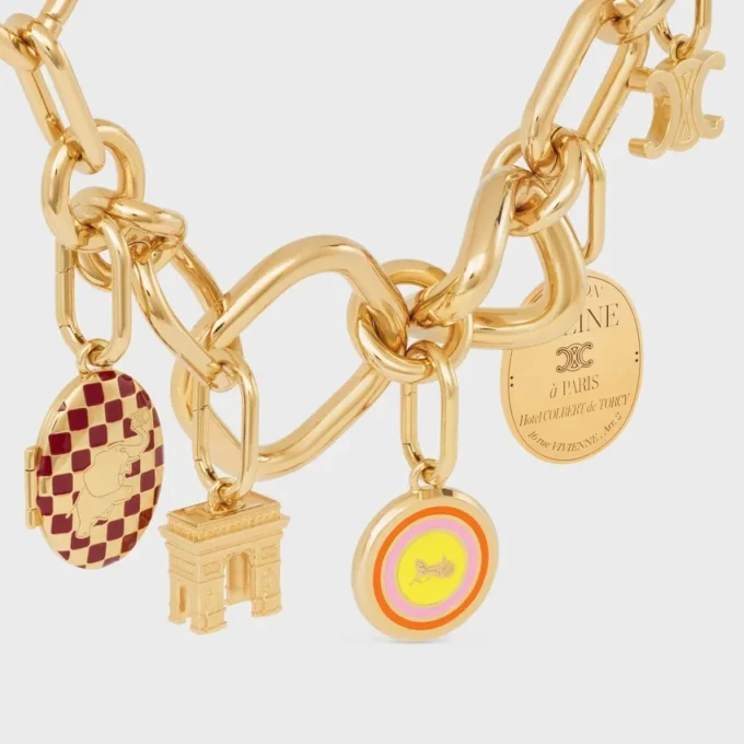 Charms Sulky Medal z emalii i mosiądzu z wykończeniem w kolorze złotym