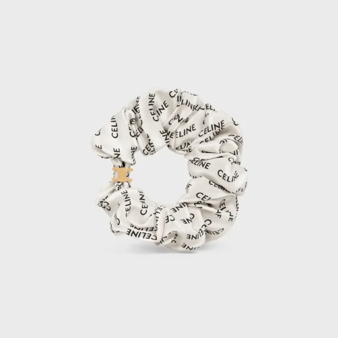 Gumka do włosów CELINE Scrunchy Rayure z jedwabiu i mosiądzu z wykończeniem w kolorze złotym Gumka do włosów CELINE Scrunchy Rayure z jedwabiu i mosiądzu z wykończeniem w kolorze złotym