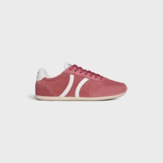 Niskie sznurowane trampki CELINE Jogger z motywem Triomphe, wykonane z zamszowej skóry cielęcej i skóry cielęcej Niskie sznurowane trampki CELINE Jogger z motywem Triomphe, wykonane z zamszowej skóry cielęcej i skóry cielęcej