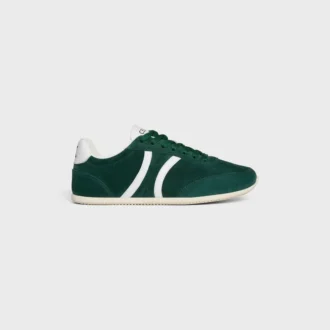 Niskie sznurowane trampki CELINE Jogger z motywem Triomphe, wykonane z zamszowej skóry cielęcej i skóry cielęcej Niskie sznurowane trampki CELINE Jogger z motywem Triomphe, wykonane z zamszowej skóry cielęcej i skóry cielęcej