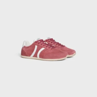 Niskie sznurowane trampki CELINE Jogger z motywem Triomphe, wykonane z zamszowej skóry cielęcej i skóry cielęcej Niskie sznurowane trampki CELINE Jogger z motywem Triomphe, wykonane z zamszowej skóry cielęcej i skóry cielęcej