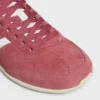 Niskie sznurowane trampki CELINE Jogger z motywem Triomphe, wykonane z zamszowej skóry cielęcej i skóry cielęcej Niskie sznurowane trampki CELINE Jogger z motywem Triomphe, wykonane z zamszowej skóry cielęcej i skóry cielęcej