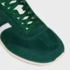 Niskie sznurowane trampki CELINE Jogger z motywem Triomphe, wykonane z zamszowej skóry cielęcej i skóry cielęcej Niskie sznurowane trampki CELINE Jogger z motywem Triomphe, wykonane z zamszowej skóry cielęcej i skóry cielęcej