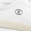 Niskie sznurowane trampki CELINE Lou z motywem Triomphe, wykonane ze skóry jagnięcej Niskie sznurowane trampki CELINE Lou z motywem Triomphe, wykonane ze skóry jagnięcej
