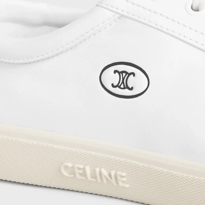 Niskie sznurowane trampki CELINE Lou z motywem Triomphe, wykonane ze skóry jagnięcej Niskie sznurowane trampki CELINE Lou z motywem Triomphe, wykonane ze skóry jagnięcej