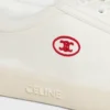 Niskie sznurowane trampki CELINE Lou z napisem Triomphe, wykonane z płótna i skóry cielęcej