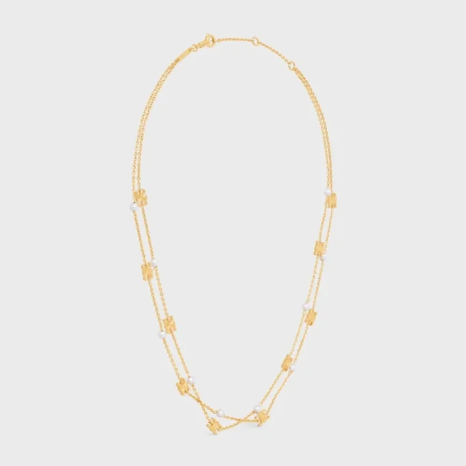 Podwójny naszyjnik Triomphe Pearl z mosiądzu z wykończeniem w kolorze złotym i perłami z żywicy Podwójny naszyjnik Triomphe Pearl z mosiądzu z wykończeniem w kolorze złotym i perłami z żywicy