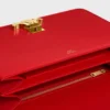 Średnia torba Triomphe Folio z błyszczącej skóry cielęcej Średnia torba Triomphe Folio z błyszczącej skóry cielęcej