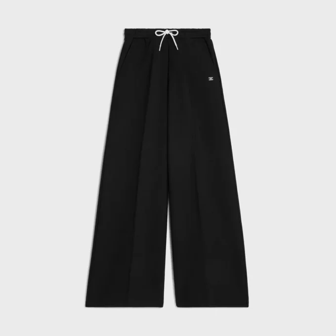 Rozkloszowane spodnie dresowe z bawełnianego polaru Rozkloszowane spodnie dresowe z bawełnianego polaru
