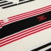 Sweter polo z bawełny w paski Sweter polo z bawełny w paski