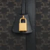 Torba podróżna z tkaniny Triomphe Canvas i skóry cielęcej Torba podróżna z tkaniny Triomphe Canvas i skóry cielęcej
