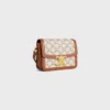 Torba Teen Triomphe z tkaniny Triomphe Canvas i skóry cielęcej Torba Teen Triomphe z tkaniny Triomphe Canvas i skóry cielęcej